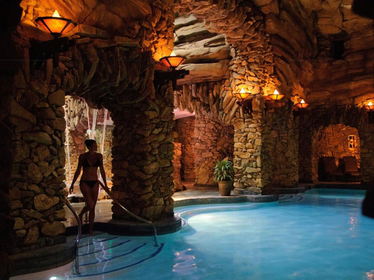 Girl in cave pool at the The Omni Grove Park Inn & Spa
